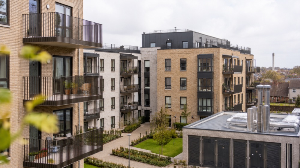 Residential apartment blocks served by a communal heating system