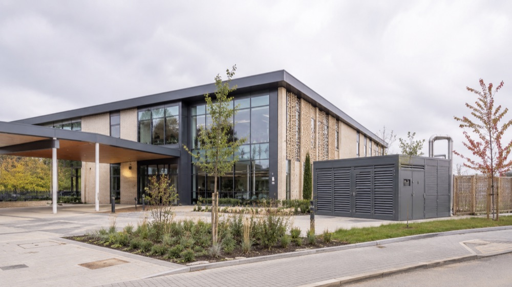 Modern public-sector building with an external plant enclosure